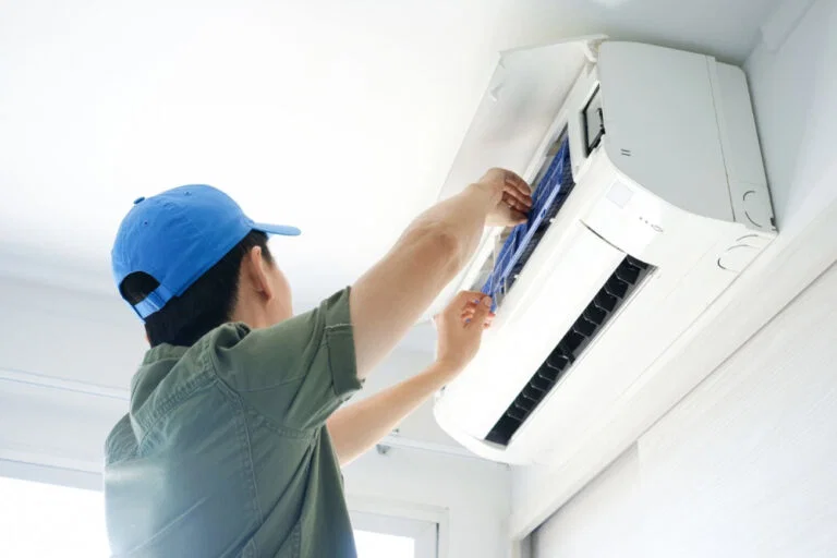 Meridian Furnace & AC Pros technician servicing an HVAC system in Meridian, ID